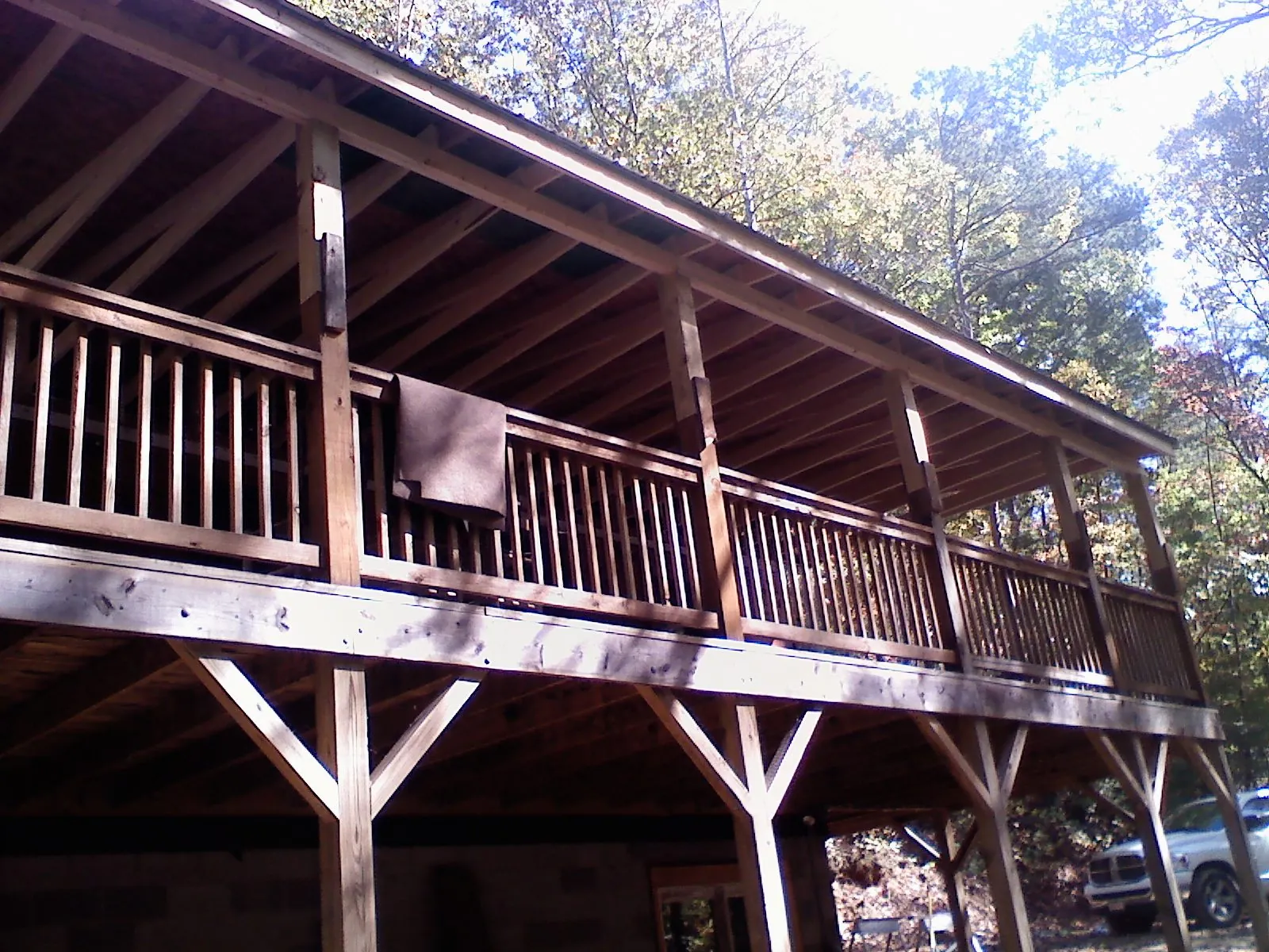 Timber framing under a new elevated porch and deck — Roof Leak Repair in Pisgah Forest by Roofing Brothers